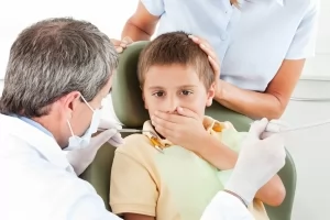Как вырвать ребенку зуб без боли